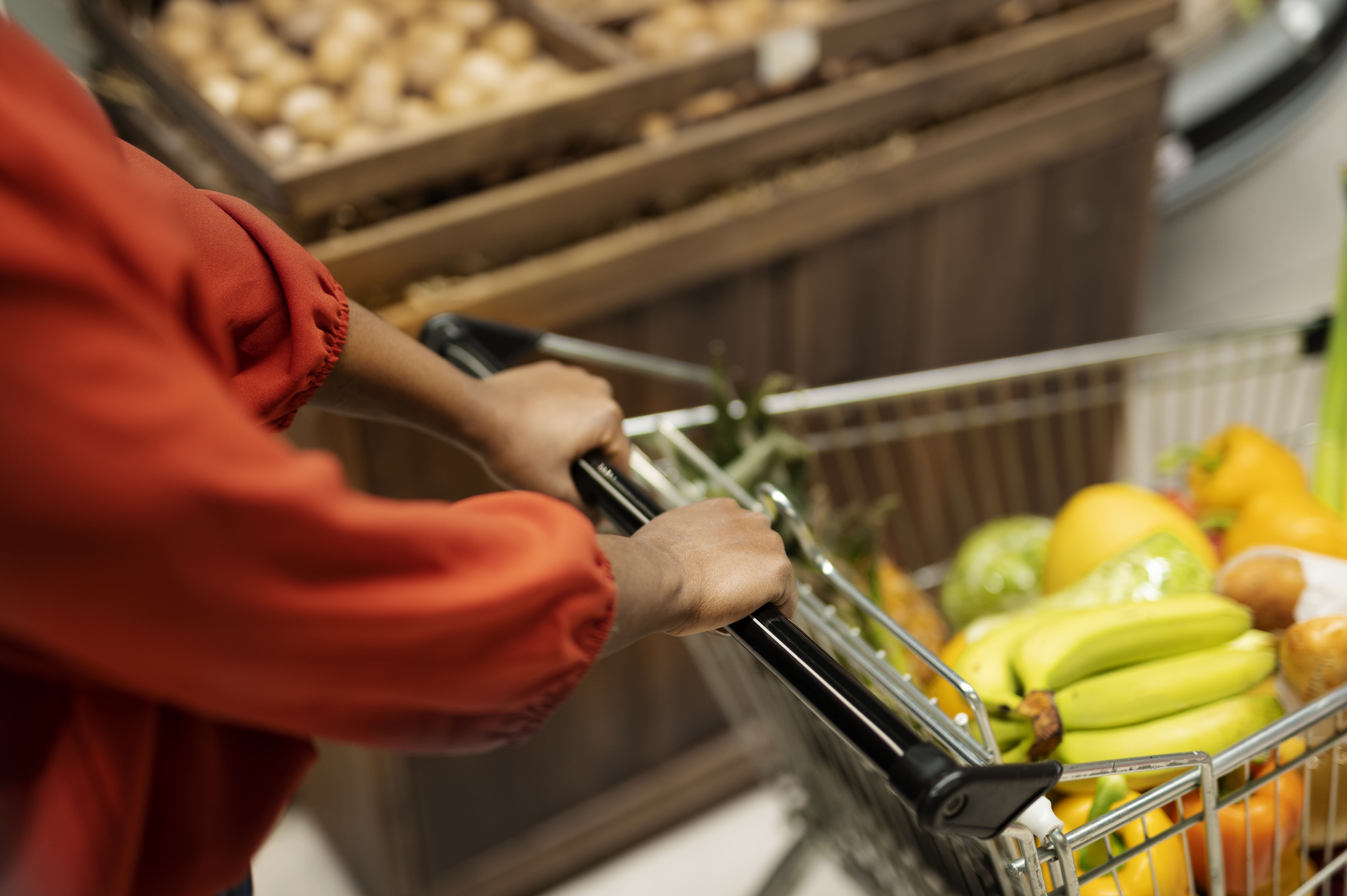 woman-pushing-shopping-cart-supermarket (1).jpg